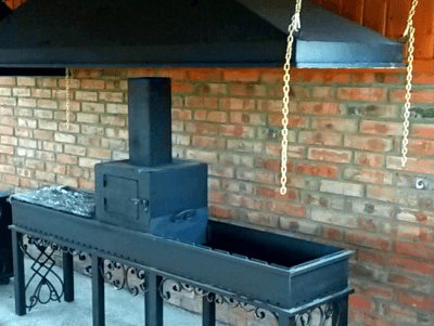Avgasparaply över grillen